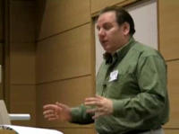 Photograph of Professor Mark Jancovich making presentation